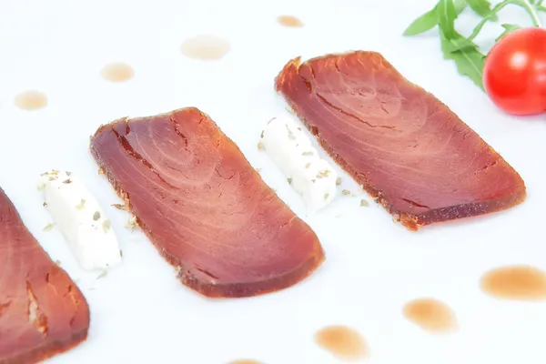 Closeup of the three slices of smoked tuna. — Stock Photo, Image