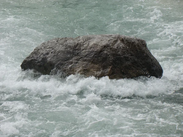 stock image Stone in water