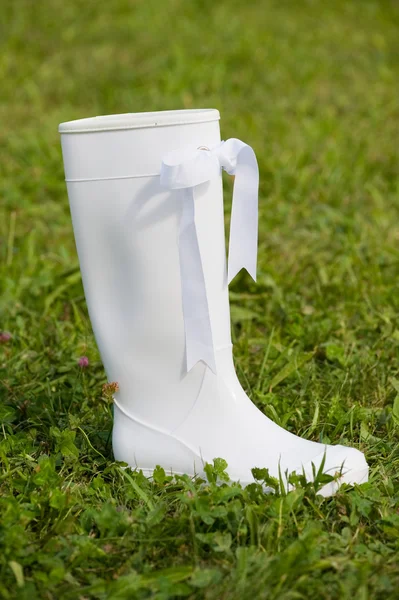 stock image White rubber boot