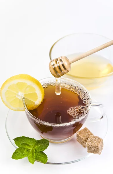 Honey tea with lemon and leaf mint — Stock Photo, Image