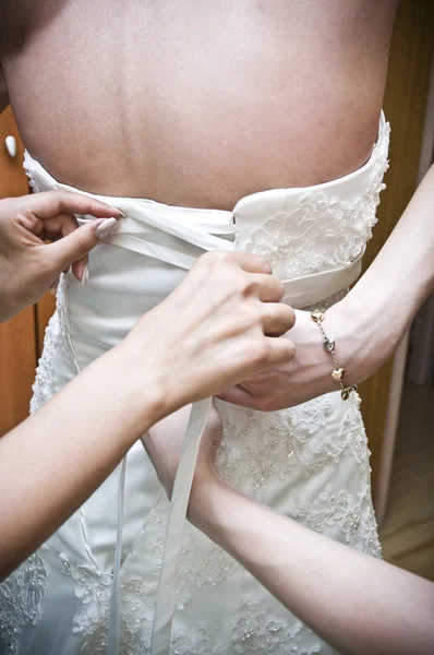 Wedding Dressing the bride — Stock Photo, Image