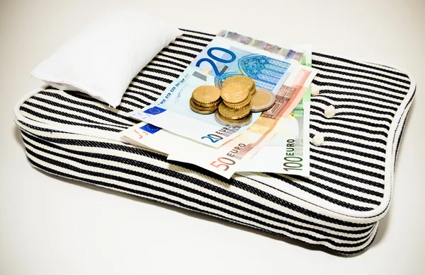 Dinero en el colchón Imagen De Stock