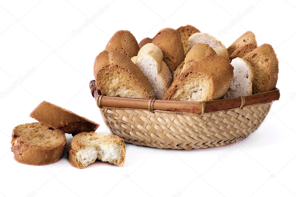 A basket with several slices of toasted bread
