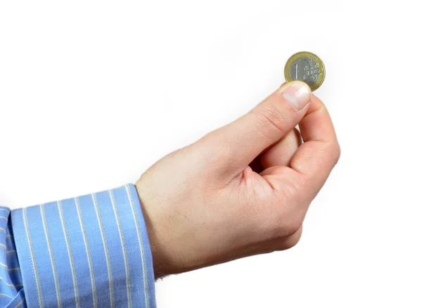 stock image Hand holding one euro coin