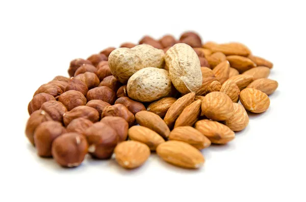Arašídy, mandle, lískové ořechy Stock Fotografie