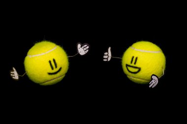 Two tennis balls talking clipart