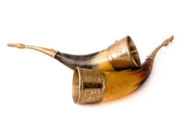 Old and curved drinking horns clipart