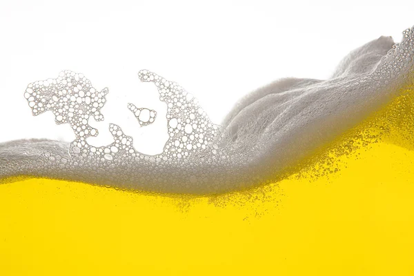Bier schaum alkohol gaststjalá tte oro gelb welle wasser tropfen —  Fotos de Stock