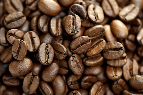 Kahverengi kahve çekirdekleri kazık — Stok fotoğraf