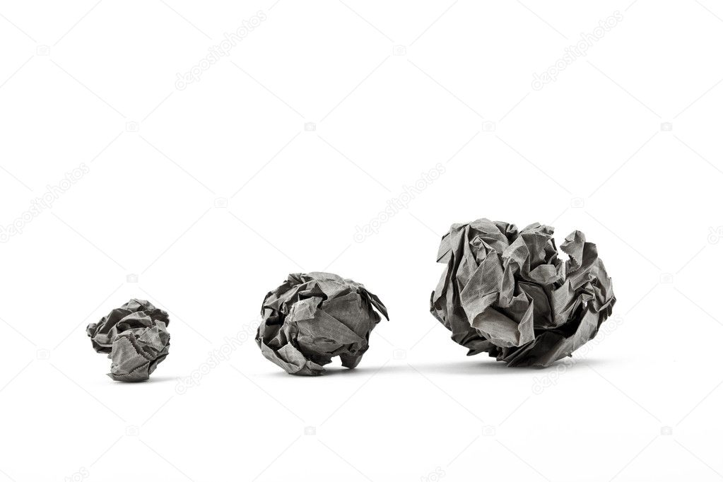Three Crumpled paper balls on White Background