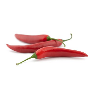 Red chilli peppers on white background clipart