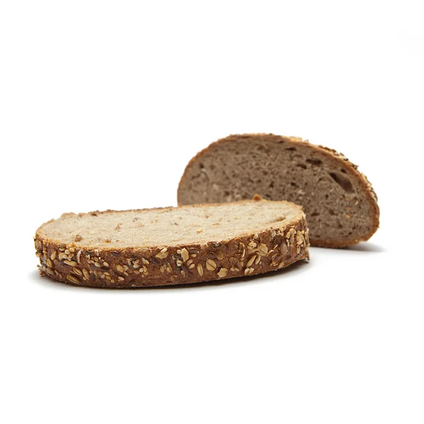 Ψωμί ολικής άλεσης σε λευκό φόντο — Φωτογραφία Αρχείου