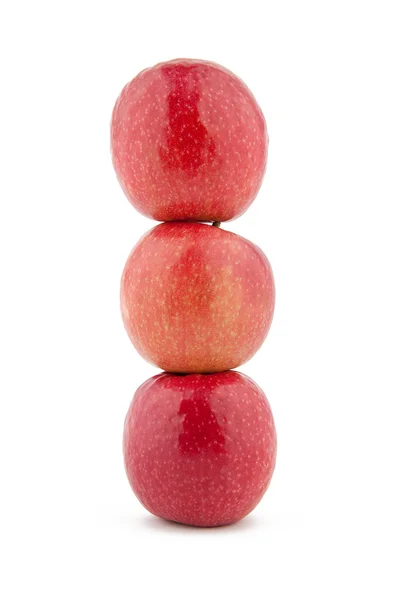 Torre de manzanas rojas sobre fondo blanco —  Fotos de Stock