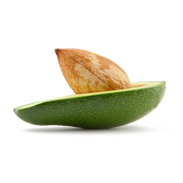 Green avocado fruit with core on white background — Stock Photo, Image