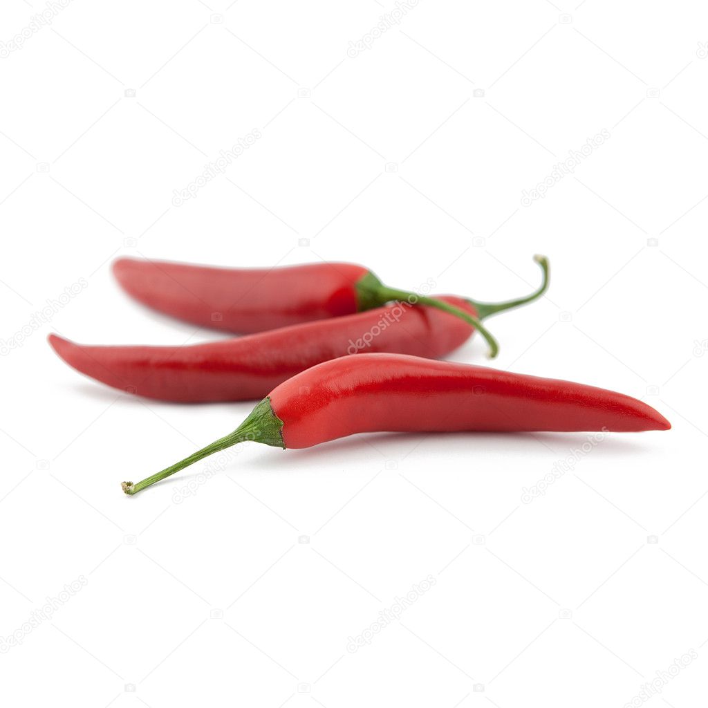 Red chilli peppers on white background