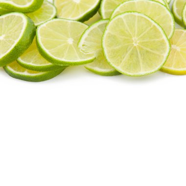 Green limes discs Fruit Cocktail on white backgorund clipart