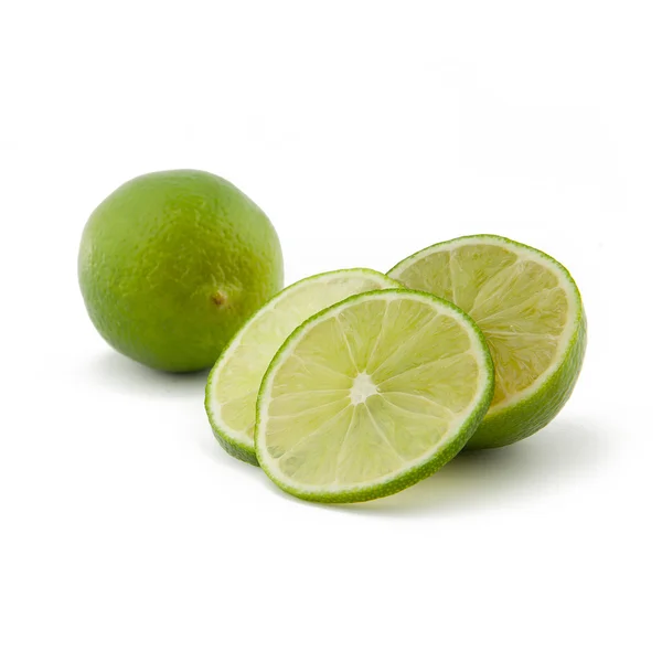 Zelené limety ovocný koktejl na bílé backgorund — Stock fotografie