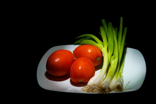 Tomaten und Gänsezwiebeln — Stockfoto