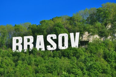 The name of the Brasov city in volumetric letters on Tampa mountain clipart