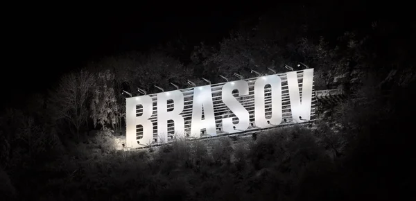 stock image The name of the Brasov city in volumetric letters on Tampa mountain