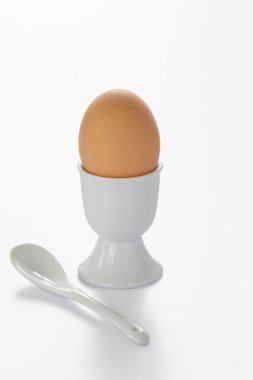 Brown egg for breakfast clipart