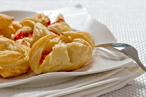 Puff-pastry pasties with tomatoes oregano and feta cheeses — Stock Photo, Image