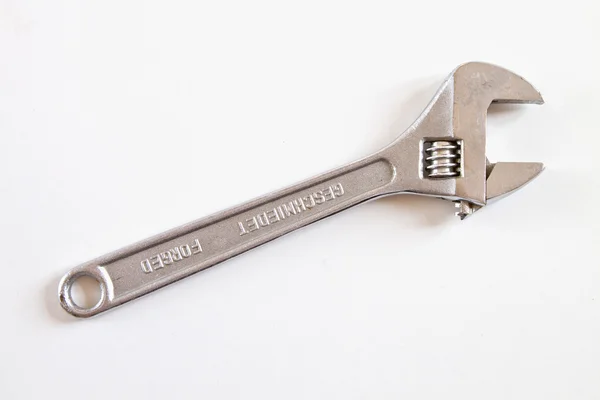 An adjustable spanner isolated on a white — Stock Photo, Image