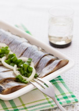 Herring fillets with herbs clipart