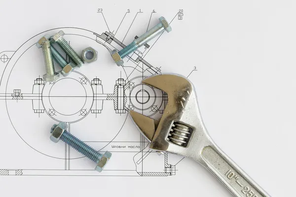 Werkzeuge auf dem Hintergrund technischer Zeichnungen — Stockfoto
