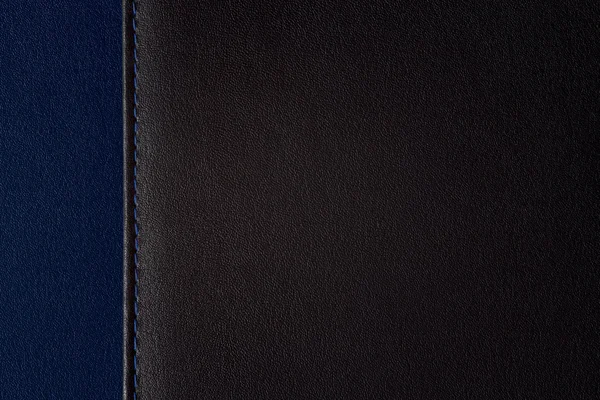 皮革背景分割两个部分，黑色和蓝色 — 图库照片