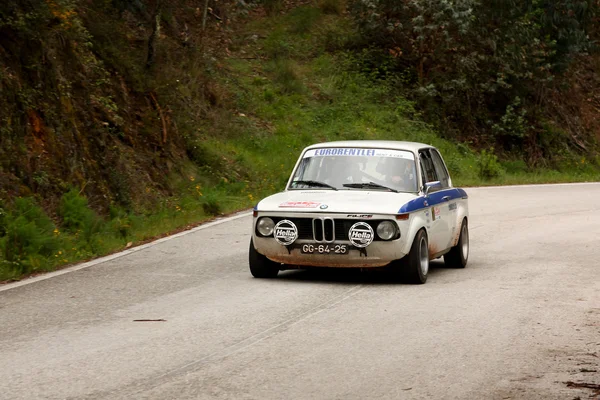 LEIRIA, PORTUGAL - APRIL 20: José Grosso drives a BMW 2002 during Day One of Rally Verde Pino 2012, in Leiria, Portugal on April 20, 2012. — Stok fotoğraf