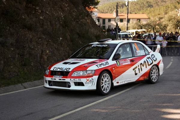 CASTELO BRANCO, PORTUGAL - MARCH 10: Diogo Salvi drives a Mitsubishi Lancer EVO VII during Rally Castelo Branco 2012, integrated on Open Championship in Castelo Branco, Portugal on March 10, 2012. — Stock Photo, Image