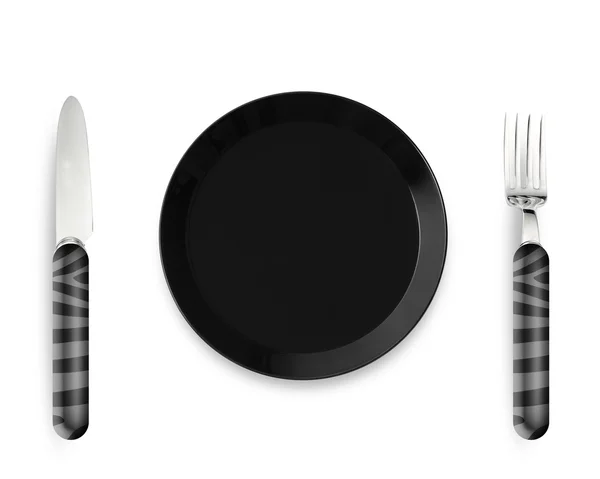 Пустая тарелка с ножом и вилкой — стоковое фото