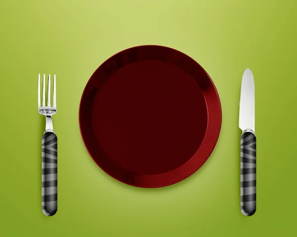 Prázdný talíř s nožem a vidličkou — Stock fotografie