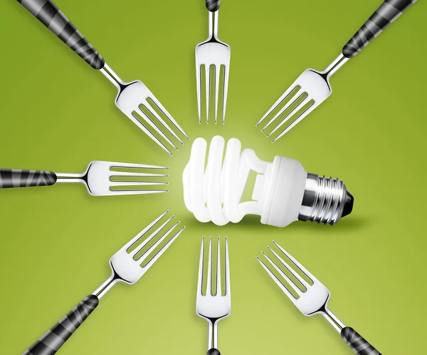 Forks around light bulb — Stock Photo, Image