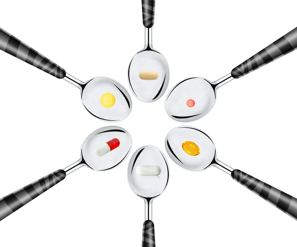 Spoons of pills — Stock Photo, Image