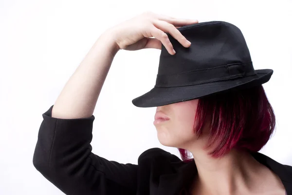 Red hairs and Black hat — Stock Photo, Image