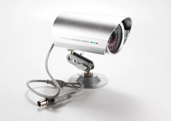 Silver isolated video surveillance camera — Stock Photo, Image