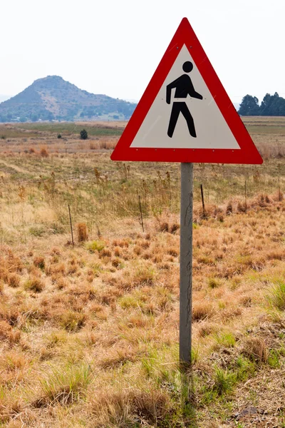 stock image Warning sign for walking along the road