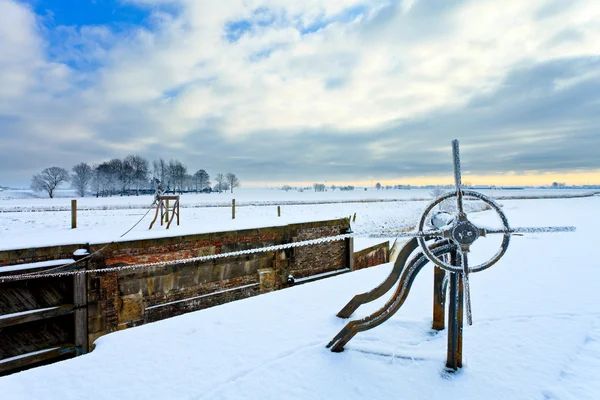Lock in a white winter landscape — Stock Photo, Image