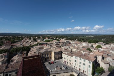 VIEW AT UZES FROM THE DUCHE D'UZES CASTLE IN UZES - FRANCE clipart