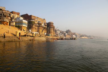 MORNING AT THE HOLY GANGES RIVER. VARANASI. INDIA clipart