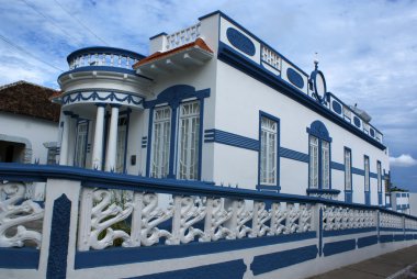 Colonial house in white and blue in Penedo (Alagoas) - Brazil clipart