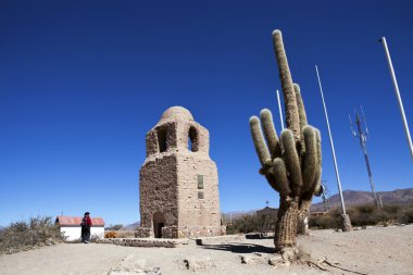 Old chapel and big cactus in Humahuaca - Jujuy - North Argentina clipart