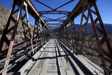 Iron bridge to Pucara in Tilcara - Jujuy - Argentina clipart