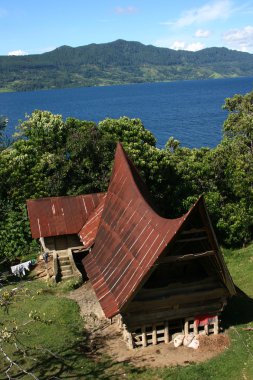 Batak house - Samosir Island in Lake Toba - Sumatra - Indonesia clipart