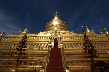 Golden temple Schwezigon Paya in Nyaung U (Bagan) - Myanmar | Burma clipart