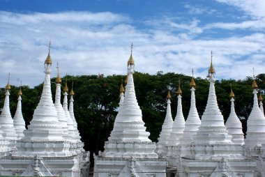 White pagodas of Sandamuni Paya - Mandalay - Myanmar (Burma) clipart