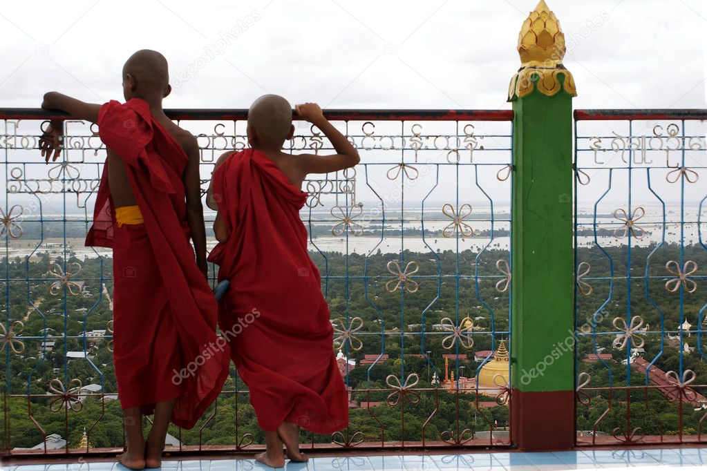 Two novices/ monks watch over Mandalay from Sagaing Hill - Myanmar (Burma)