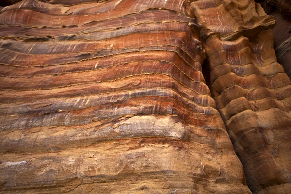 CLOSE UP OF THE ROCKS IN PETRA - AN UNESCO WORLD HERITAGE SITE IN JORDAN. — Stock Photo, Image
